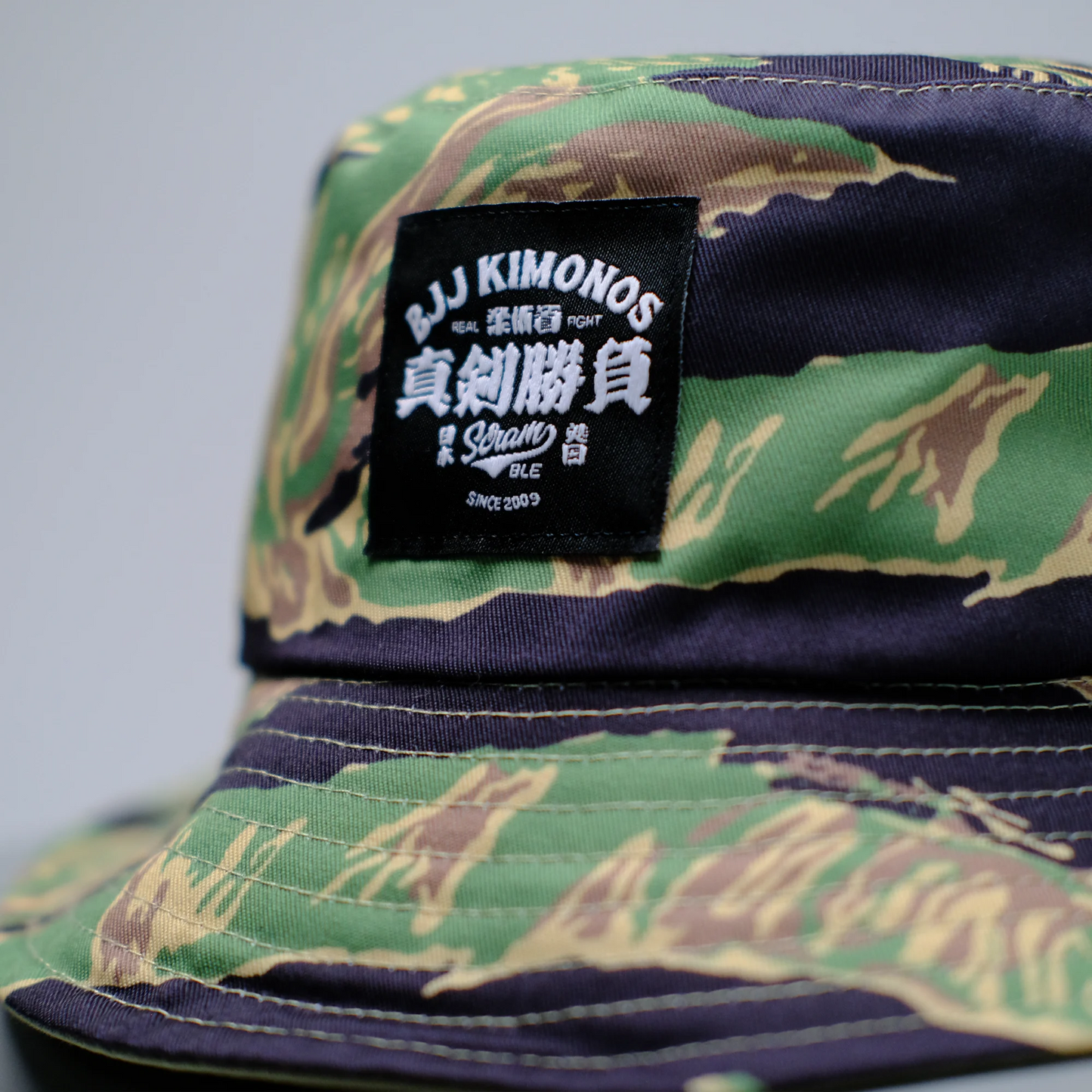 SCRAMBLE REVERSIBLE BUCKET HAT