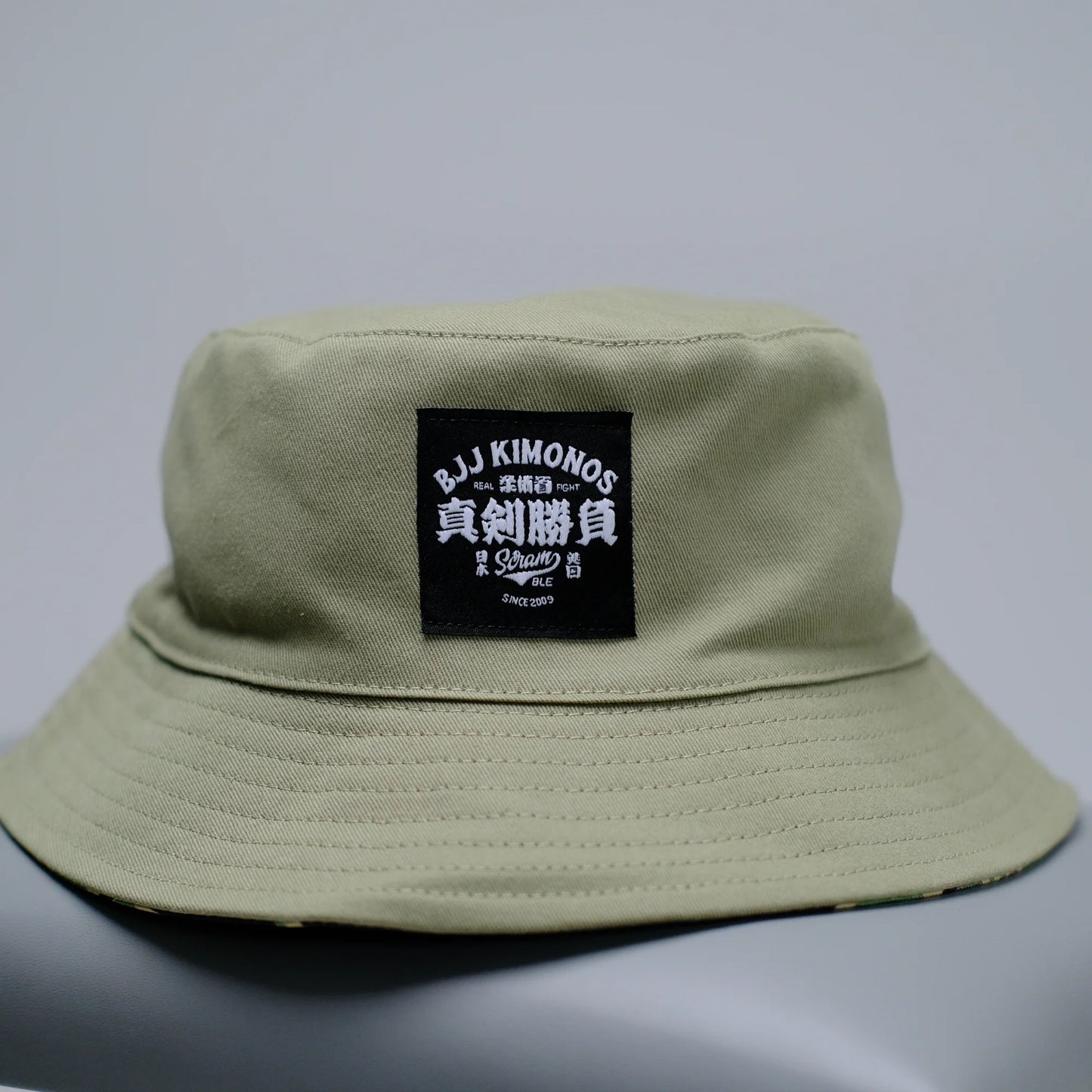 SCRAMBLE REVERSIBLE BUCKET HAT